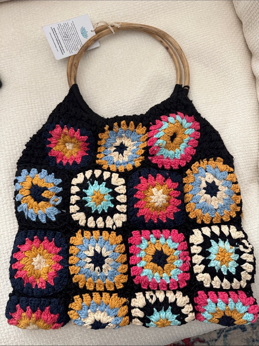 Black Crochet Tote with Colorful Granny Squares and Wooden Handles